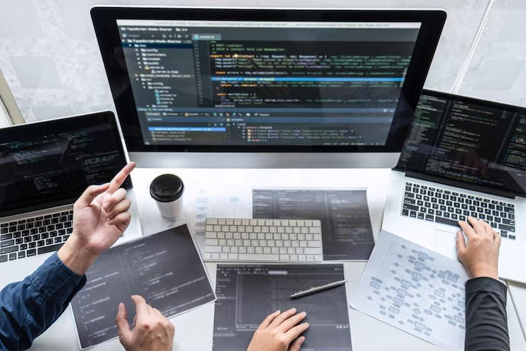 office workers with latptop and whiteboard