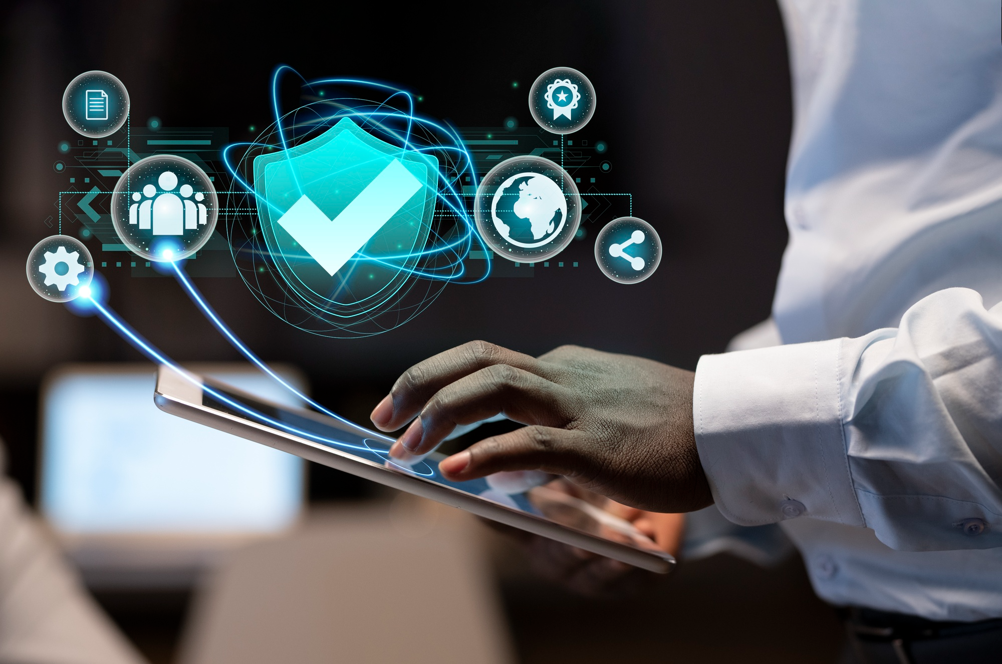 businessman using laptop with documents