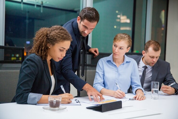 FabSoft-data-extraction-software-business-meeting-with-documents