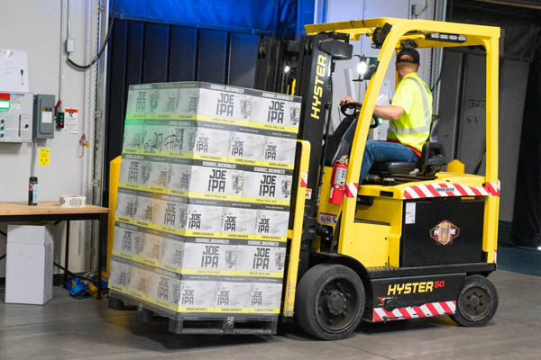 forklift with pallet in warehouse