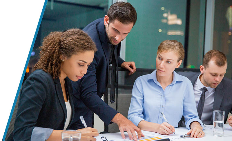 employees at table working