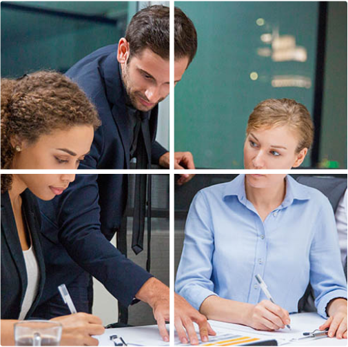 people working at a table in an office