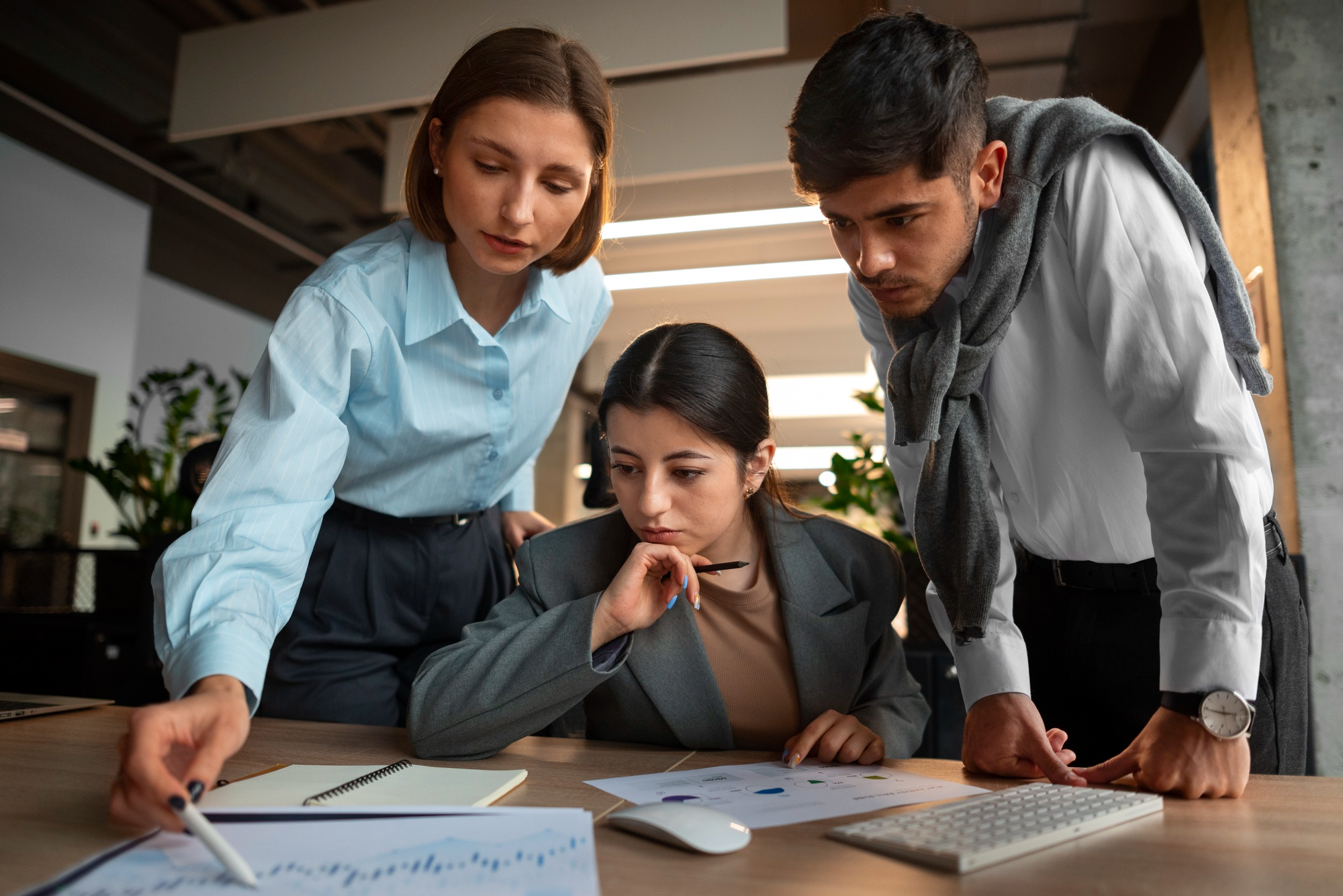 office workers with latptop and whiteboard